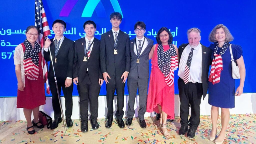MCPHS Chemistry Professor Songwen Xie, first from left, coached Team USA to four gold medals at the 57th International Chemistry Olympiad (IChO) in Dubai